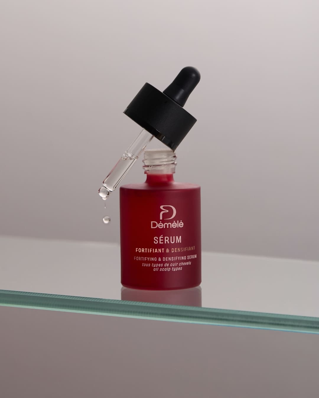 Flacon de sérum fortifiant et densifiant My Store avec pipette, visible en gros plan sur fond blanc.