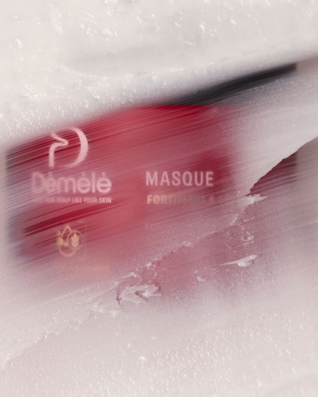 Cheveux doux et démêlés après application du masque capillaire Démélé